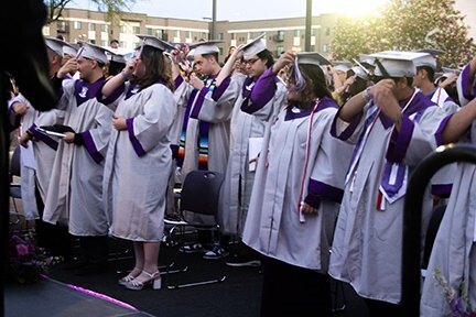 Students flip their tassels over, signifying their status as official graduates